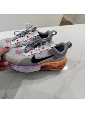 Nike Gray Sneakers with Black Swoosh and Orange/Purple Accents